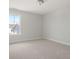 Carpeted bedroom with bright natural light from a large window at 774 Maynard Ln, Summerville, SC 29486