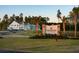 Beautiful community sign at Tidewater at Lakes of Cane Bay with lush landscaping and beautiful homes at 776 Maynard Ln, Summerville, SC 29486