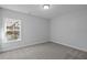 Bright bedroom featuring neutral carpet, fresh paint, natural light, and electrical outlets at 778 Maynard Ln, Summerville, SC 29486