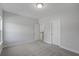 Inviting bedroom with neutral carpeting, fresh paint, two doorways, and natural light streaming in from the window at 778 Maynard Ln, Summerville, SC 29486