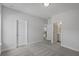 Inviting bedroom with soft carpeting, neutral walls, entry and access to an ensuite bathroom at 778 Maynard Ln, Summerville, SC 29486