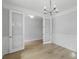 Light-filled space with neutral walls, hardwood floors, and elegant French doors at 778 Maynard Ln, Summerville, SC 29486