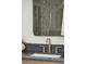 Modern bathroom features a silver faucet and tiled wall at 786 Maynard Ln, Summerville, SC 29486