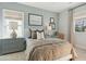 Cozy bedroom with neutral tones, a plush bed, and a stylish desk area at 786 Maynard Ln, Summerville, SC 29486