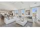 Spacious open-concept living area with a large sectional sofa and adjacent kitchen at 786 Maynard Ln, Summerville, SC 29486