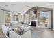 Comfortable living room with a fireplace, vaulted ceiling, and large sectional sofa at 786 Maynard Ln, Summerville, SC 29486