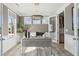 Well-lit office space with a neutral color scheme, complemented by a modern desk and area rug at 786 Maynard Ln, Summerville, SC 29486