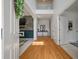 Bright foyer featuring hardwood floors, high ceilings, and an open floor plan at 8328 Berringer Bluff, North Charleston, SC 29418