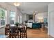 Inviting living room with a decorative fireplace, hardwood floors, and plenty of natural light at 8328 Berringer Bluff, North Charleston, SC 29418
