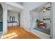 Open living space with hardwood floors, and an adjacent room at 8328 Berringer Bluff, North Charleston, SC 29418
