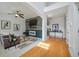 Cozy living room featuring modern decor, neutral tones, and plenty of natural light at 8328 Berringer Bluff, North Charleston, SC 29418