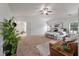 Bright main bedroom with carpet, high ceilings, seating area, and an abundance of natural light at 8328 Berringer Bluff, North Charleston, SC 29418