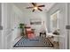 Bright office space with natural light, a ceiling fan, and a cozy seating area at 8328 Berringer Bluff, North Charleston, SC 29418