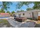 Backyard patio featuring comfortable seating and a swimming pool, perfect for outdoor relaxation and entertaining at 8767 Auburn Dr, North Charleston, SC 29406