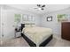 Calm bedroom featuring a neutral color palette, natural light, and comfortable furnishings at 8767 Auburn Dr, North Charleston, SC 29406