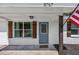 Inviting home exterior with brick facade, wooden shutters, and well-maintained landscaping at 8767 Auburn Dr, North Charleston, SC 29406