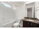 Bathroom with shower-tub combo, granite vanity with storage, and neutral paint at 9079 Parlor Dr, Ladson, SC 29456