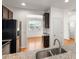 Granite counters highlight this kitchen overlooking the breakfast nook at 9079 Parlor Dr, Ladson, SC 29456