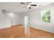 Bright space with hardwood floors, sliding glass doors, and large windows at 9079 Parlor Dr, Ladson, SC 29456