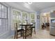 Breakfast nook with bay window, perfect for enjoying morning meals with natural light at 9091 Delancey Cir, North Charleston, SC 29406