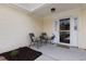 Inviting front porch with chairs and decor, offering a cozy spot to relax outdoors at 9091 Delancey Cir, North Charleston, SC 29406