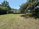 A large backyard with grass and trees at 980 Margaret Dr, Ladson, SC 29456