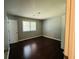 Bedroom with hardwood floors, one window, and light gray walls at 980 Margaret Dr, Ladson, SC 29456