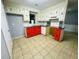 Eat-in kitchen with white cabinets, red base cabinets, dishwasher and stainless steel sink at 980 Margaret Dr, Ladson, SC 29456