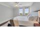 Cozy bedroom featuring neutral decor and large windows allowing lots of natural light at 1 King # 702, Charleston, SC 29401