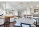 Spacious living area with a kitchen, dining area, and entertainment center at 1 King # 702, Charleston, SC 29401