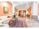 Spacious lobby with marble flooring, elegant seating, chandeliers, and decorative rugs at 1 King # 702, Charleston, SC 29401