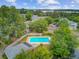 Overhead shot featuring a pool, townhomes, parking area, and green landscaping at 1001 Waterwood Dr, Goose Creek, SC 29445