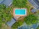 Aerial view of a community pool surrounded by trees and landscaping at 1001 Waterwood Dr, Goose Creek, SC 29445