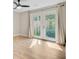 Bright room with wood floors and access to the backyard through glass doors at 1001 Waterwood Dr, Goose Creek, SC 29445