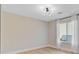 Bright bedroom with modern light fixture and sheer white curtains adds charm at 1001 Waterwood Dr, Goose Creek, SC 29445