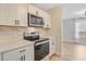 Modern kitchen with stainless steel appliances, quartz countertops, and contemporary finishes at 1001 Waterwood Dr, Goose Creek, SC 29445