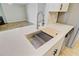 Close up of the stylish kitchen sink and countertops with a modern faucet at 1001 Waterwood Dr, Goose Creek, SC 29445