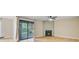Spacious living room with sliding glass doors to patio and fireplace offers natural light at 1001 Waterwood Dr, Goose Creek, SC 29445