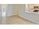 Open floor plan showcasing the living area and kitchen with white cabinets and sleek countertops at 1001 Waterwood Dr, Goose Creek, SC 29445