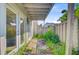 Outdoor patio with weathered wood, overgrown greenery, and a white wood pergola at 1001 Waterwood Dr, Goose Creek, SC 29445