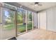 Screened porch with neutral walls and a view of the yard at 1001 Waterwood Dr, Goose Creek, SC 29445