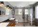 Bathroom featuring a glass walk-in shower, dual vanity, and modern fixtures at 1033 Mathis Ferry Rd, Mount Pleasant, SC 29464