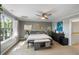 Bright bedroom with carpet, large window, and neutral gray walls at 1033 Mathis Ferry Rd, Mount Pleasant, SC 29464