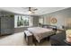 Comfortable bedroom with a large window and neutral gray walls at 1033 Mathis Ferry Rd, Mount Pleasant, SC 29464