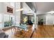 Dining room with high ceilings, large windows, hardwood floors, and modern light fixture at 1033 Mathis Ferry Rd, Mount Pleasant, SC 29464