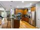 Modern kitchen featuring stainless steel appliances, granite countertops, and wood cabinetry at 1033 Mathis Ferry Rd, Mount Pleasant, SC 29464