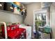 Organized laundry room with front loading washer and dryer, storage shelves and window at 1033 Mathis Ferry Rd, Mount Pleasant, SC 29464