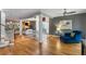 Open-concept living area featuring hardwood floors, modern furnishings, and ample natural light at 1033 Mathis Ferry Rd, Mount Pleasant, SC 29464