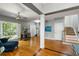 Spacious living room with hardwood floors, natural light, and neutral gray walls at 1033 Mathis Ferry Rd, Mount Pleasant, SC 29464