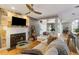 Inviting living room with fireplace, comfortable seating, and open access to the dining area at 1033 Mathis Ferry Rd, Mount Pleasant, SC 29464